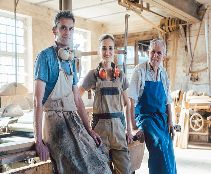 Carpenter,Family,Business,With,Generations,In,The,Workshop,Having,A