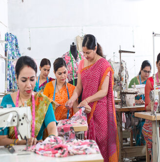 Woman,Textile,Worker,Checking,Garment,Stock,At,Factory