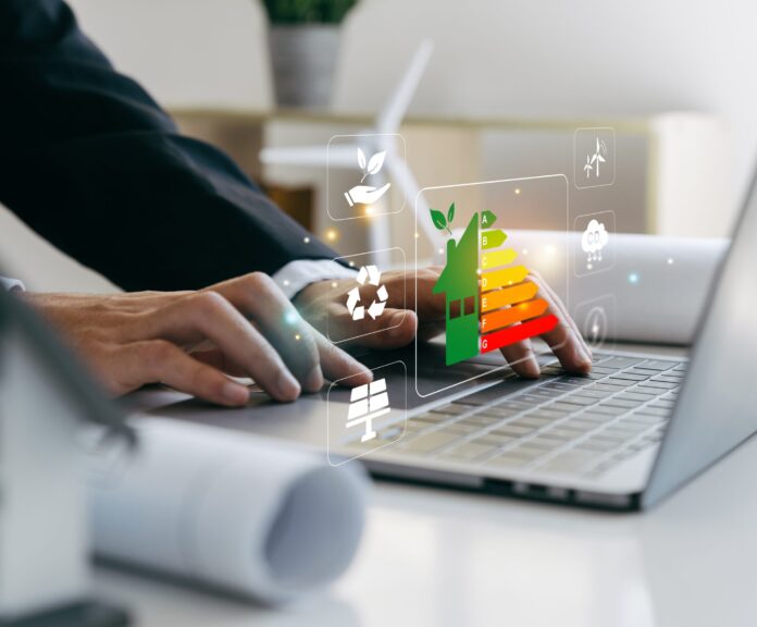 Home,Improvement,Concept,,Hand,Of,Businessman,Using,Laptop,With,Energy