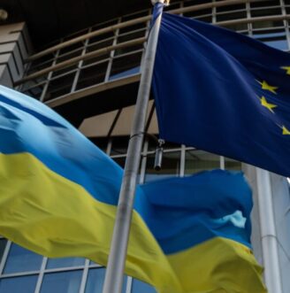 Ukrainian,Flag,And,European,Union,Flag,In,Front,Of,The